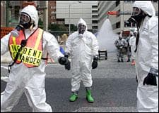 The Baltimore City Fire Department Hazmat team during an emergency training exercise to simulate a terrorist attack involving weapons of mass destruction in Baltimore, July 13, 2002. (AP Photo/Alex Dorgan-Ross)