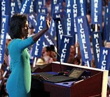 Michelle Obama addresses the crowd at the Democratic Natrional Convention at the Pepsi Center in Denver on Monday, Aug. 25, 2008. (AP Photo/(DARIN MCGREGOR/ROCKY MOUNTAIN NEWS)