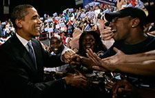 Sen. Barack Obama greets supporters at a primary night rally in Raleigh, N.C., on May 6, 2008. (AP Photo/Jae C. Hong)
