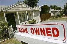 A sign of a house under foreclosure, California. (AP)