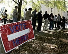 Voters stand in line to cast their ballots early at the Fulton County Annex  in Sandy Springs, Ga., Thursday, Oct. 30, 2008.  (AP Photo/John Bazemore)