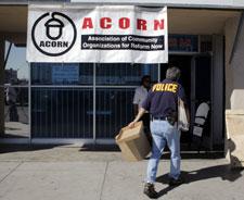 In this Oct. 7, 2008 file photo, an investigator enters the ACORN office in Las Vegas. (AP Photo/Jae C. Hong, File)