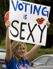 University of Oregon student Ella Barrett holds up a sign on campus as part of an effort to sign up new voters in Eugene, Ore., Thursday, Oct. 2, 2008. (AP Photo/Don Ryan)