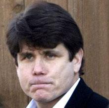 Illinois Gov. Rod Blagojevich departs his home in Chicago, Thursday, Dec. 11, 2008. (AP Photo/Charles Rex Arbogast)