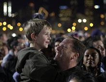 Supporters gather at the election night party for Democratic presidential candidate Sen. Barack Obama, D-Ill., at Grant Park in Chicago, Tuesday night, Nov. 4, 2008. (AP Photo/David Guttenfelder)