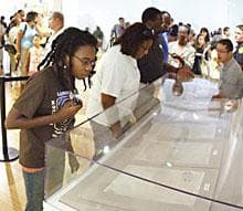 Kaamilah Furqah, 13,  left, of Little Rock views the Emancipation Proclamation Saturday, Sept. 22, 2007 at the William J. Clinton Presidential Library in Little Rock, Ark. (AP Photo/Brian Chilson)