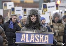 Juneau-Douglas High School student Amy Bartholemew leads a parade of 200 delegates toward the 50th Anniverary statehood cauldron lighting ceremony in Anchorage, Alaska Saturday, Jan. 3, 2009. Bartholemew is student body president of the high school representing Alaska's captial. (AP)