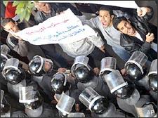 Egyptian activists are confronted by police during a protest in Cairo against the Israeli attacks in Gaza, on Dec. 31, 2008. (AP)