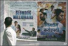 A man walks past a poster of &quot;Slumdog Millionaire,&quot; posted on a wall in Mumbai, India, Tuesday, Jan. 13, 2009. India's movie-mad millions have not yet seen &quot;Slumdog Millionaire,&quot; but this Mumbai-based fairy tale, which opens here next week, is already the toast of Bollywood. On Sunday, &quot;Slumdog?, with its cast of actors unknown outside India and its story set on the gritty streets of Mumbai, went home with four Golden Globe awards, and became the movie to beat at the Academy Awards. (AP)