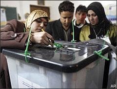 Election officials check the seals on a ballot box after the polls closed in the country's provincial elections in central Baghdad, Iraq, Saturday, Jan. 31, 2009. Iraqis passed through security checkpoints and razor-wire cordons to vote Saturday in provincial elections that are considered a crucial test of the nation's stability as U.S. officials consider the pace of troop withdrawals. (AP)