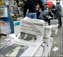 Newspapers headlining the inauguration of President Barack Obama are sold the day after the event, Wednesday, Jan. 21, 2009, in the Studio City area of Los Angeles. (AP)