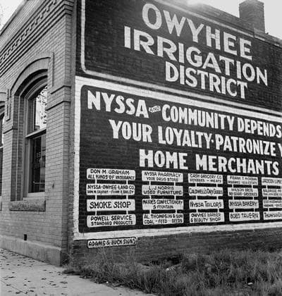 Lange’s original caption: “October 14, 1939. Nyssa, Malheur County, Oregon. Sign on old bank building which now houses the office of the Bureau of Reclamation.” 
