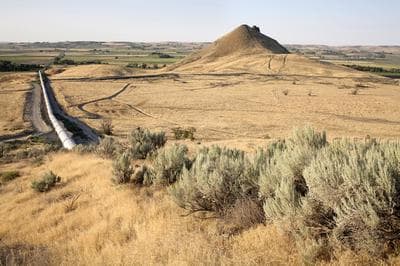 July 27, 2006. Malheur County, Oregon. Malheur Butte and siphon seen from below Ontario Heights on the opposite side of the valley from Dorothea Lange’s 1939 photograph. 