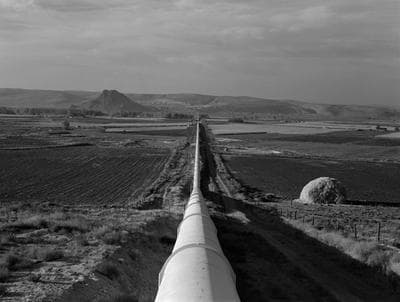 Lange’s original caption: “October 16, 1939. Malheur County, Oregon. Shows siphon, 5 miles long, 8 feet in diameter, which carries water to Dead Ox Flat. This is the world’s longest siphon.” 