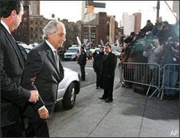 Bernard Madoff arrives at federal court in New York Thursday, March 12, 2009. Madoff will plead guilty to charges that he engineered one of the largest investment scams in U.S. history and was ready to face a prison sentence of up to 150 years. (AP)
