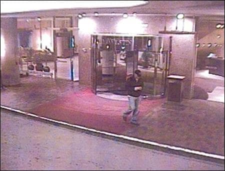 This frame grab from a video surveillance camera at the Westin hotel on Wednesday, April 15, shows a &quot;person of interest&quot; in attacks on two masseuses-for-hire at luxury hotels. Police have now charged a Boston University medical student with the crimes. (AP Photo)
