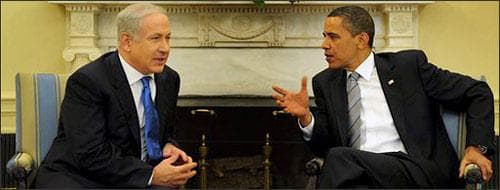 In this photo released by the Israeli Government Press Office, US President Barack Obama speaks with Israeli Prime Minister Benjamin Netanyahu, left, during their meeting in the White House in Washington, Monday, May 18, 2009. The leaders of the United States and Israel tackle an array of Mideast issues on which they disagree: U.S. overtures to once-shunned Iran and Syria and pressure on Israel to support a Palestinian state. (AP)
