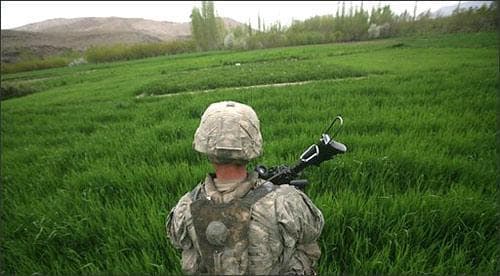 A U.S soldier of 3rd Brigade, 10th Mountain Division patrol, seen during a search operation for members of the Taliban, in Tangi valley of Wardak province west of Kabul, Afghanistan, Sunday, April 26, 2009. (AP)