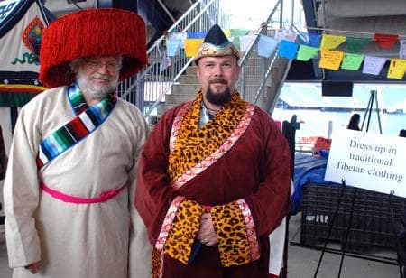 The concourse at Gillette Stadium transformed into a Tibetan fair for the day, and included a station that invited eventgoers to dress up in traditional Tibetan clothing. (Lisa Tobin/WBUR)
