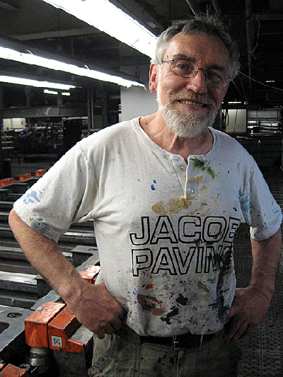 Francis Burke has worked at Cranston Print for 35 years. He says he was ready for retirement anyways. (Sarah Bush/WBUR)