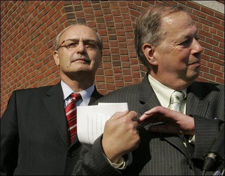 Former Massachusetts House Speaker Salvatore DiMasi, left, leaves federal court as his attorney Thomas Kiley, right, speaks briefly to reporters after DiMasi was indicted on federal corruption charges in Boston, Tuesday. (AP Photo)