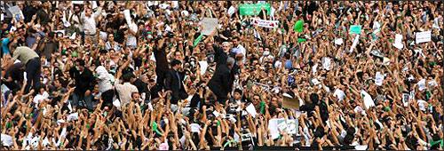 In this image made available from Mousavi's election campaign media operation Ghalam News shows Iranian opposition leader Mir Hossein Mousavi waving to supporters at a demonstration in Tehran on Thursday June, 18, 2009. (AP Photo/Ghalam News)