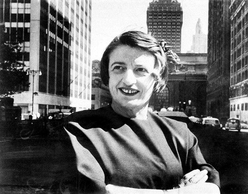 Ayn Rand, Russian-born American novelist, is shown in Manhattan with the Grand Central Terminal building in background in 1962.  (AP)