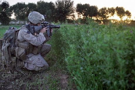 U.S. Marines from the 2nd Marine Expeditionary Brigade, 1st Battalion 5th Marines patrol early Friday morning in the Nawa district in Afghanistan&#039;s Helmand province. (AP Photo)