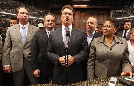 Gov. Arnold Schwarzenegger, flanked by Senate Minority Leader Dennis Hollingsworth, R-Temecula, left, Assembly Minority Leader Sam Blakeslee, second from left, Senate President Pro Tem Darrell Steinberg, D-Sacramento, second from right and Assembly Speaker Karen Bass, D-Los Angeles, discusses the budget compromise reached to resolve California's $26.3 billion budget deficit at the Capitol in Sacramento on Monday. (AP)