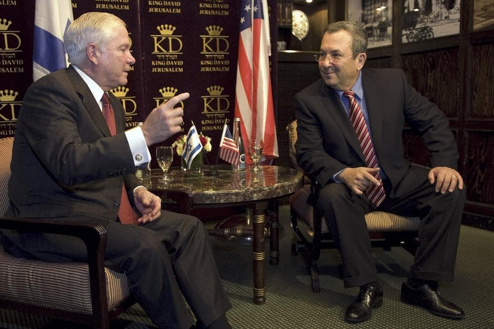 U.S. Defense Secretary Robert Gates, left, meets with his Israeli counterpart Ehud Barak at a Jerusalem hotel Monday. Barak says, &quot;no option should be removed from the table,&quot; regarding potential military action against Iran. (AP Photo)