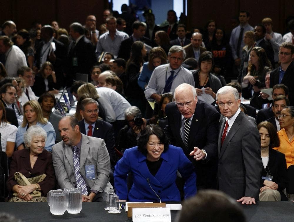 Supreme Court nominee Judge Sonia Sotomayor prepares to testify on Capitol Hill in Washington, Monday, July 13, 2009, before the Senate Judiciary Committee. From left are, her mother Celina Sotomayor, her brother Juan Sotomayor, Senate Judiciary Committee Chairman Sen. Patrick Leahy, D-Vt., and the committee's ranking Republican Sen. Jeff Sessions, R-Ala.  (AP Photo/Pool, Win McNamee)