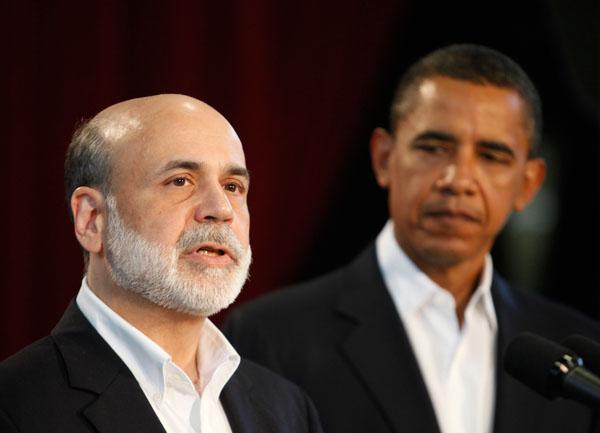 President Obama looks on after announcing he is keeping Federal Reserve Chairman Ben Bernanke to a second term during a news conference in Oak Bluffs, Mass. (AP)