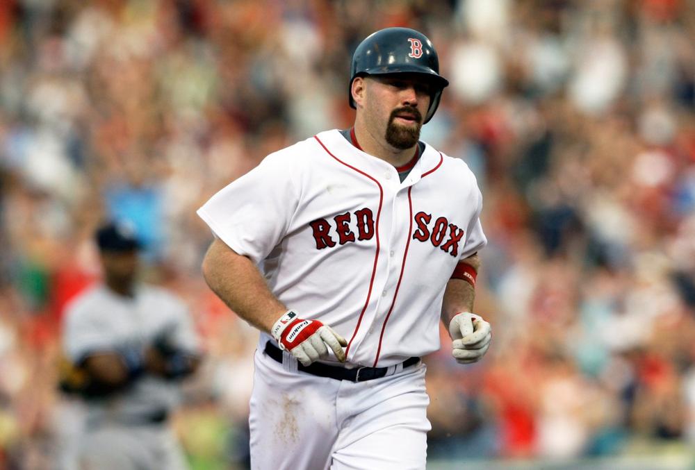 Red Sox' Kevin Youkilis rounds the bases after his two-run homer in the sixth inning against the Yankees at Fenway on Saturday. (AP)