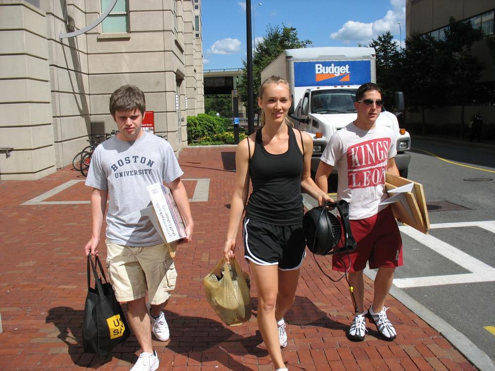 Boston University Seniors Ben Simon, Justin Marble and Erica Masini are moving back to campus with no concern about swine flu.  But area colleges and universities are very worried about a possible outbreak. (Photo by WBUR)