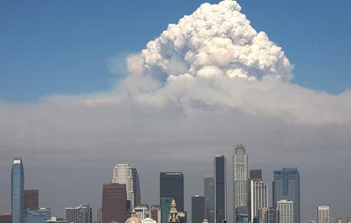 Smoke from the Station Fire rises over downtown Los Angeles on Monday, Aug. 31, 2009. (AP)