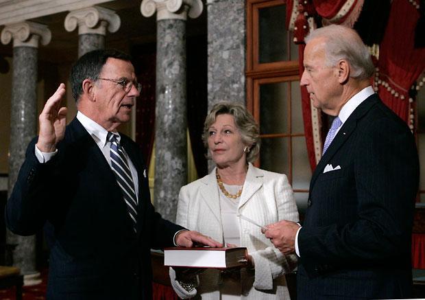 Vice President Joe Biden, right, administers the Senate oath to Paul Kirk Jr. as Kirk's wife, Gail, looks on. (AP)