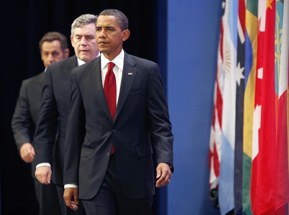 President Barack Obama, followed by British Prime Minister Gordon Brown, center, and French President Nicolas Sarkozy, arrive to make a statement on Iran's nuclear facility, Friday, Sept. 25, 2009, during the G-20 Summit in Pittsburgh. (AP)