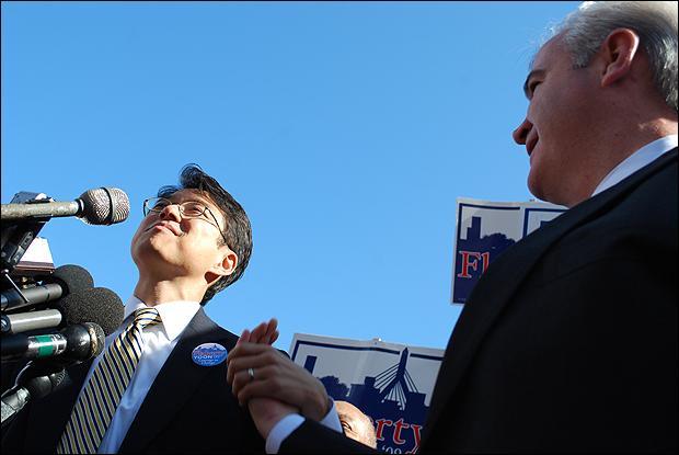 City Councilor Sam Yoon, left, and his former opponent Michael Flaherty. (Bianca Vazquez Toness/WBUR)