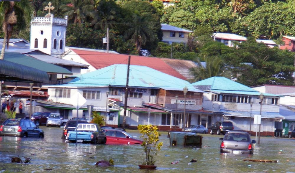 A main road in the downtown area of Fagatogo, is seen flooded by water from a tsunami located in the main town area in American Samoa on Tuesday, Sept. 29, 2009. Towering tsunami waves spawned by a powerful earthquake swept ashore on Samoa and American Samoa early Tuesday, flattening villages, killing at least 34 people and leaving dozens of workers missing at devastated National Park Service facilities. (AP)