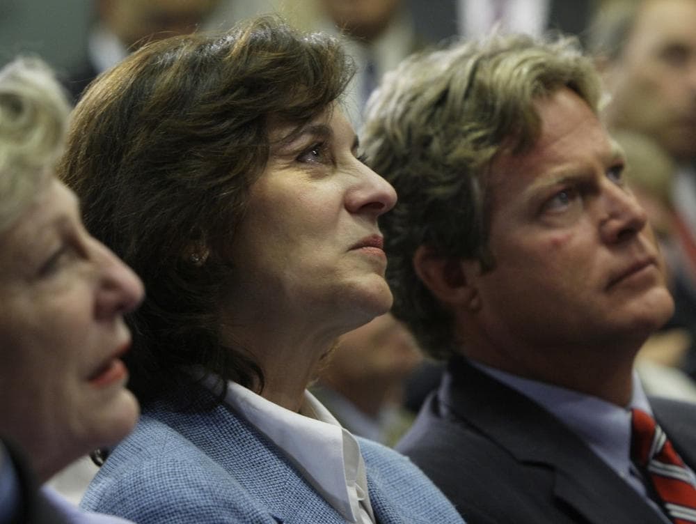 Victoria Reggie Kennedy, the late Sen. Edward M. Kennedy's widow, and his son, Ted Jr., listen during the Thursday news conference. (AP)