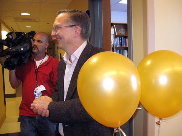 Jack Szostak is congratulated outside his office at Massachusetts General Hopsital on Monday morning 
