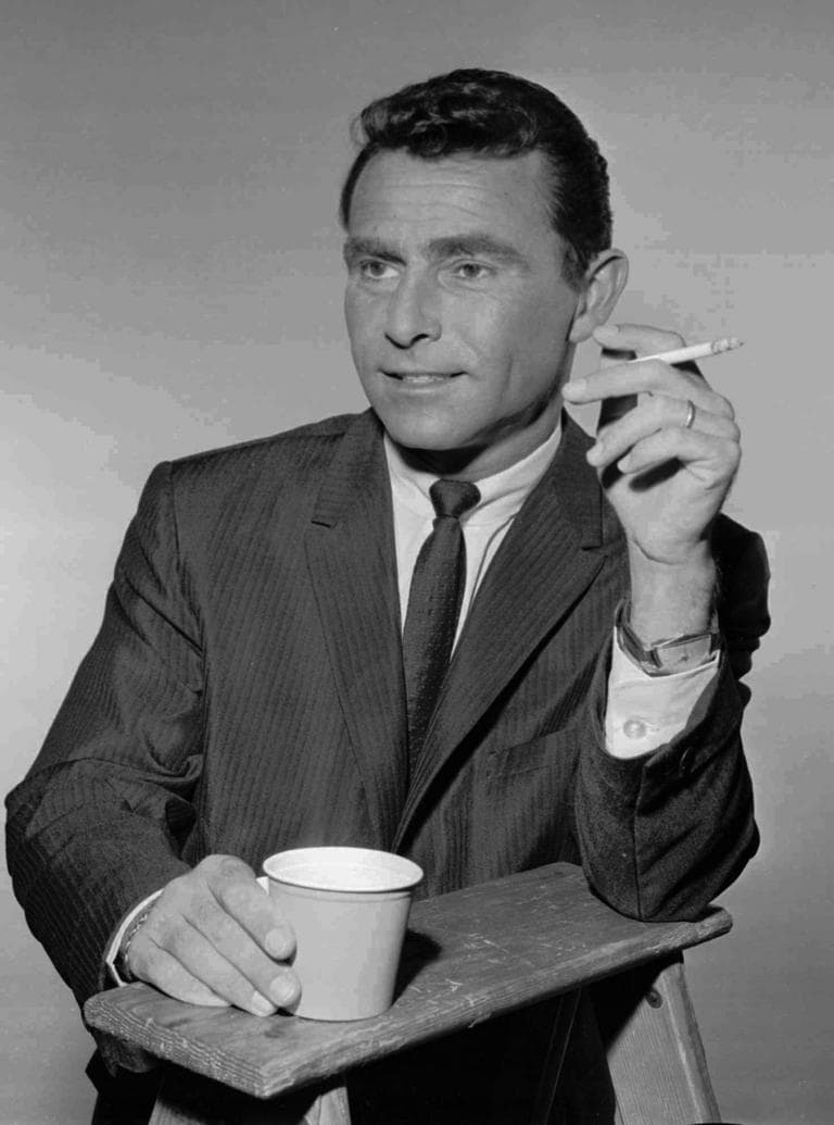 Rod Serling pauses for a cigarette and coffee between scenes during filming of &quot;The Twilight Zone&quot; in 1961. (AP)
