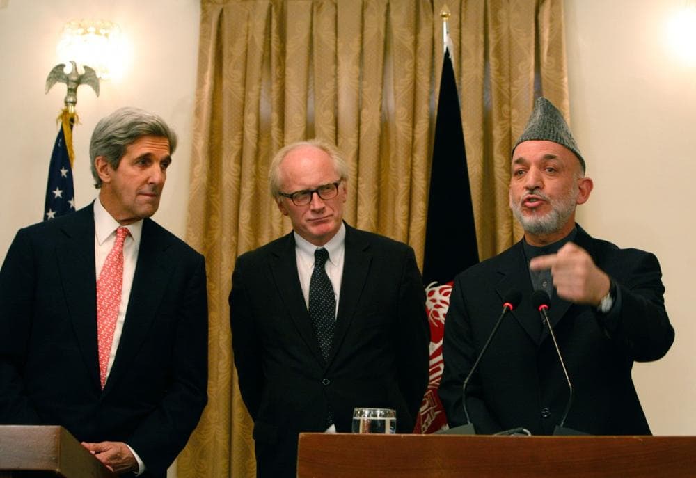 Afghan President Hamid Karzai gestures, right, as Kei Eide head of the United Nations Assistance Mission in Afghanistan, center, and U.S. Sen. John Kerry, D-Mass listen to him during a press conference, in Kabul, Afghanistan on Tuesday. Afghanistan&#039;s election commission today ordered a Nov. 7 runoff in the disputed presidential poll after a fraud investigation dropped incumbent Hamid Karzai&#039;s votes below 50 percent of the total. Karzai accepted the finding and agreed to a second round vote. (Musadeq Sadeq/AP)