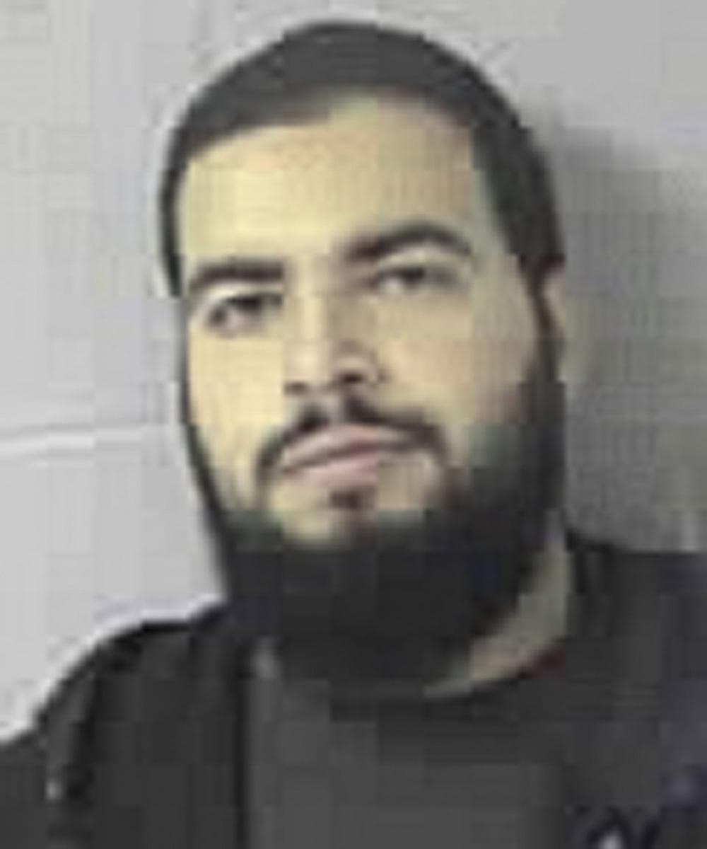 Tarek Mehanna, in a booking photo released by the Sudbury Police Department on Wednesday after Mehanna was arrested and charged with conspiring with others to plot terror attacks against shoppers in U.S. malls and against U.S. military in Iraq. (AP/Sudbury Police Department)