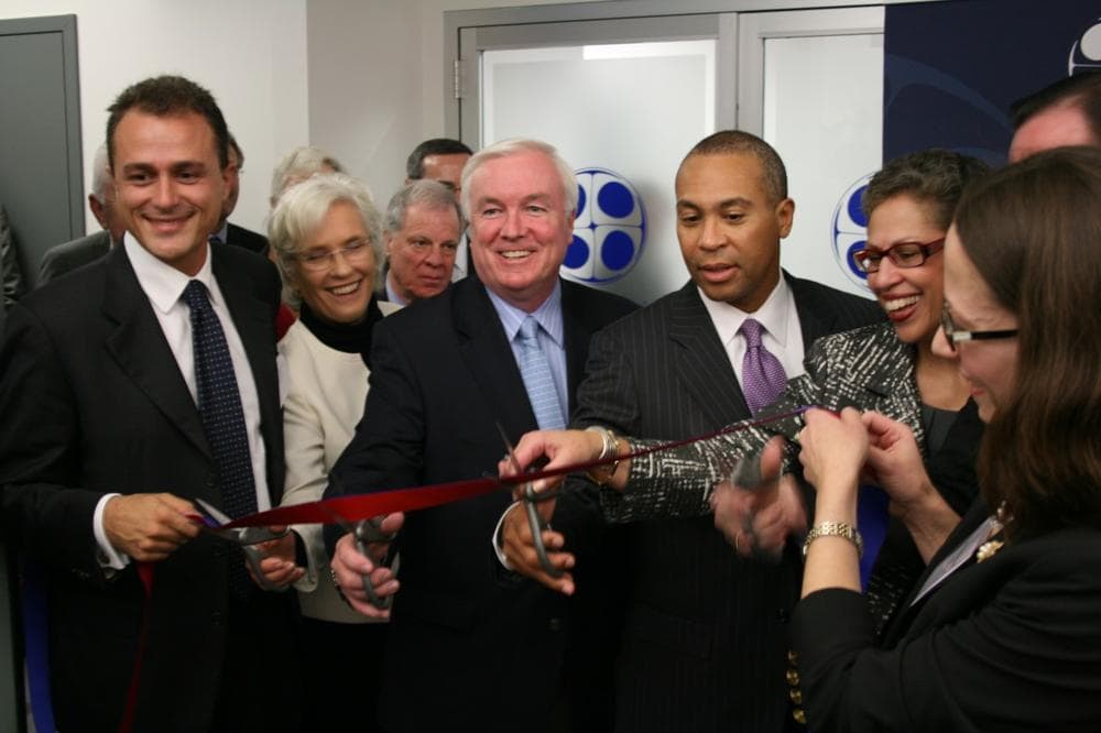 Gov. Deval Patrick cuts the ribbon at the opening of the  in Medford on Thursday. (Courtesy Massachusetts Life Sciences Center)