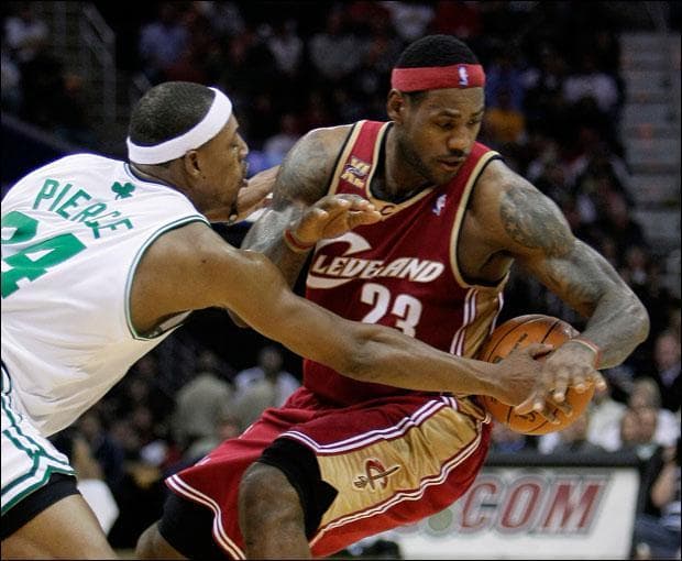 Boston Celtics&#039; Paul Pierce fouls Cleveland Cavaliers&#039; LeBron James in the second quarter on Tuesday. (Mark Duncan/AP)