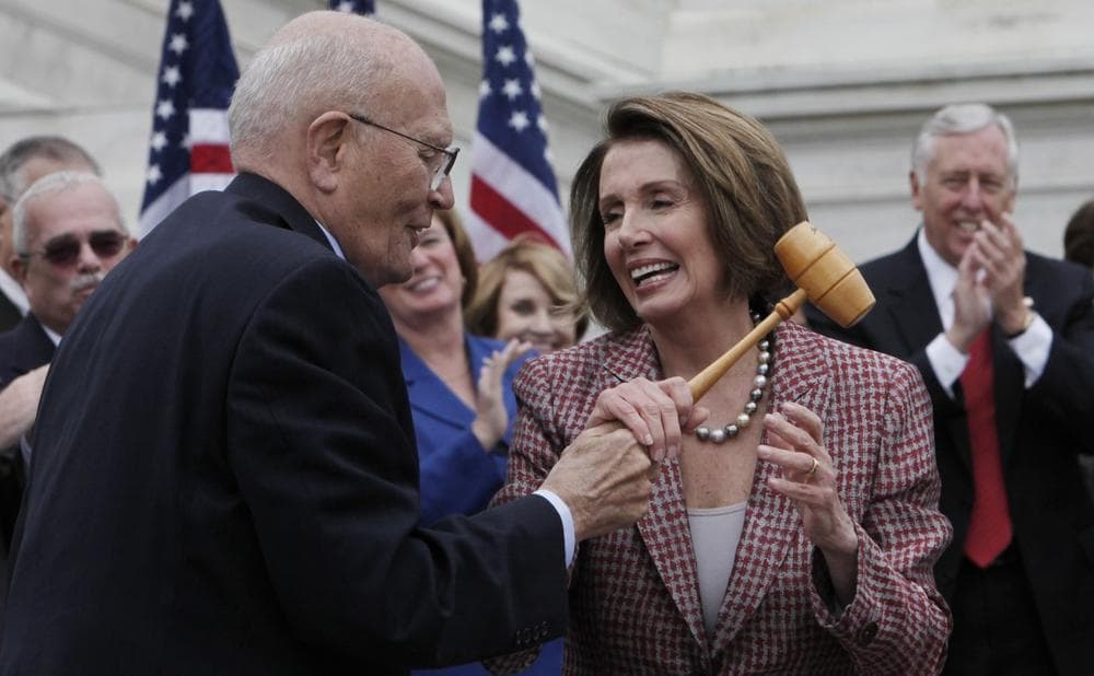 House Speaker Nancy Pelosi and Rep. John Dingell, D-Mich. hold the gavel used by Dingell as speaker pro tempore when Medicare passed in 1965, Thursday, during the announcement of a retooled health care overhaul bill on Capitol Hill. (AP)