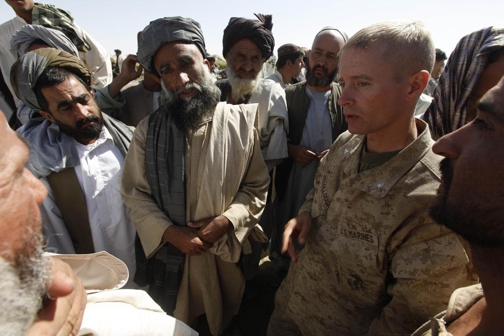 Lt. Col. William McCollough, Commanding Officer of the 1st Battalion 5th Marines, talks with local elders during a planned meeting, in Nawa district, Helmand province, southern Afghanistan, Oct. 6. (AP)