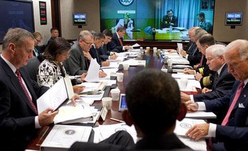 President Barack Obama and his national security team listen to a presentation from Karl W. Eikenberry, U.S. Ambassador to Afghanistan, during a briefing on Afghanistan and Pakistan in the Situation Room of the White House Wednesday, Oct. 14, 2009. (AP/White House)