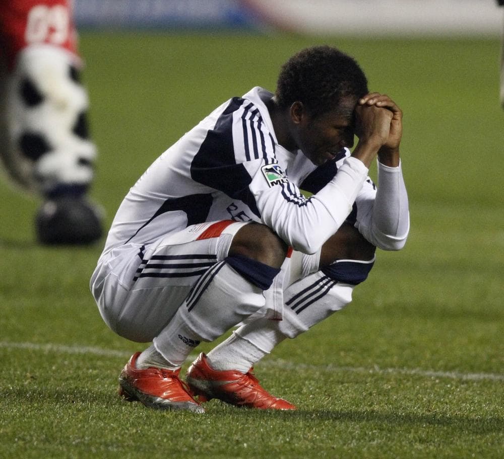 New England Revolution&#039;s Sainey Nyassi reacts to the Chicago Fire&#039;s 2-0 victory Saturday, in Bridgeview, Ill. (AP Photo/Jim Prisching)